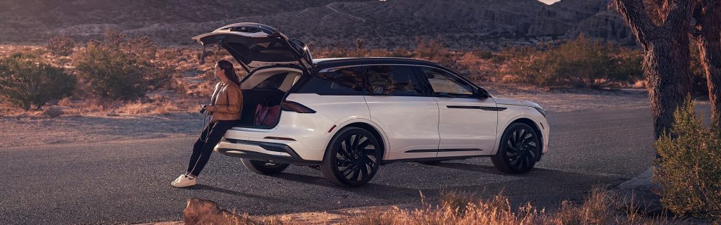 2026 Lincoln Nautilus luxury SUV showcased in an outdoor setting with open cargo space, emphasizing refined style, advanced technology, versatile storage, and elevated comfort.